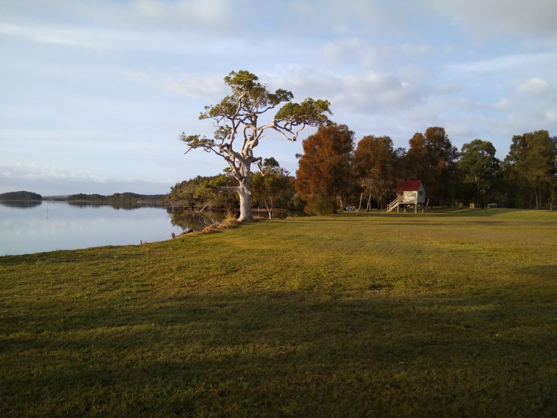 River side camping for caravan, camper or tent. Watch the tide come & go, the birds, jumping mullet, wide lawn area. Homestead nearby for facilities.