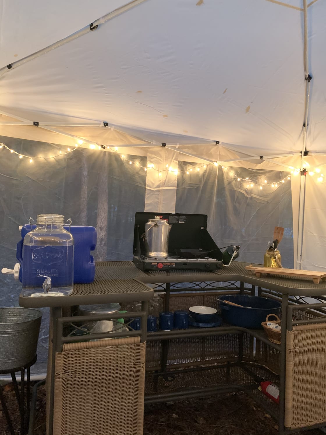 Private kitchen setup with all basic necessities. We provide a yeti cooler for your food/drink storage. Please bring ice!