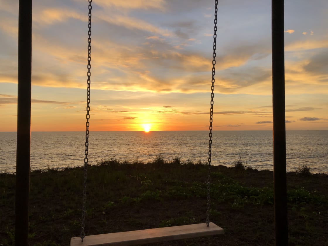 Cliff top swing with amazing sunset views