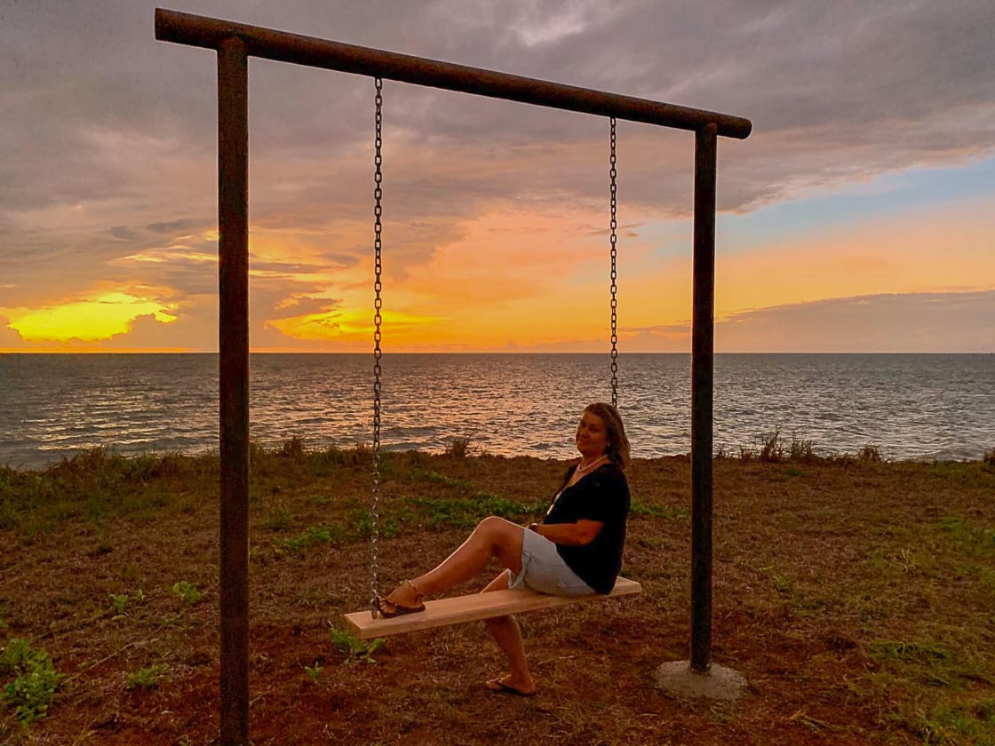 Watch the sunset or sometimes the dolphins from the swing