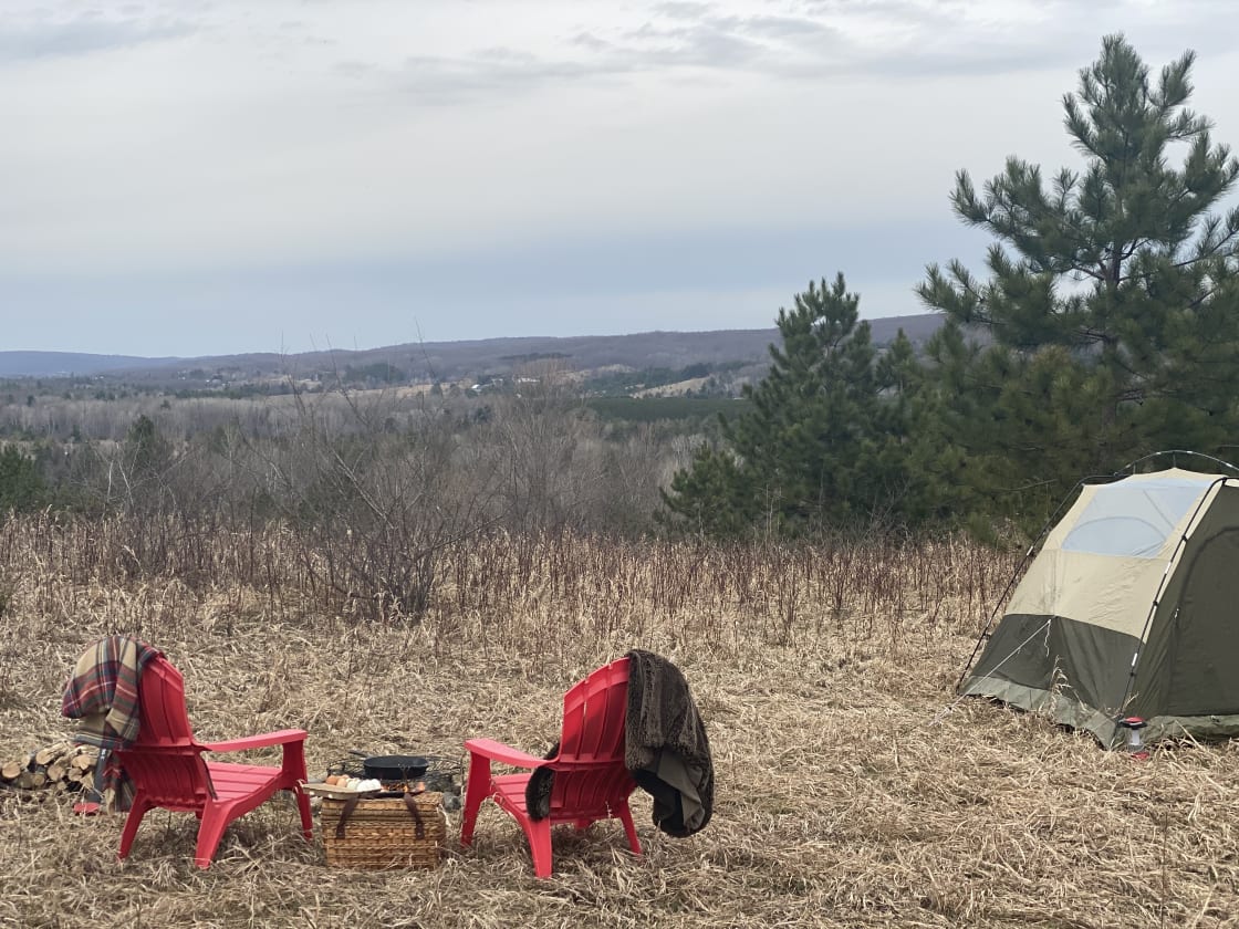 Tent camping with a hilltop view