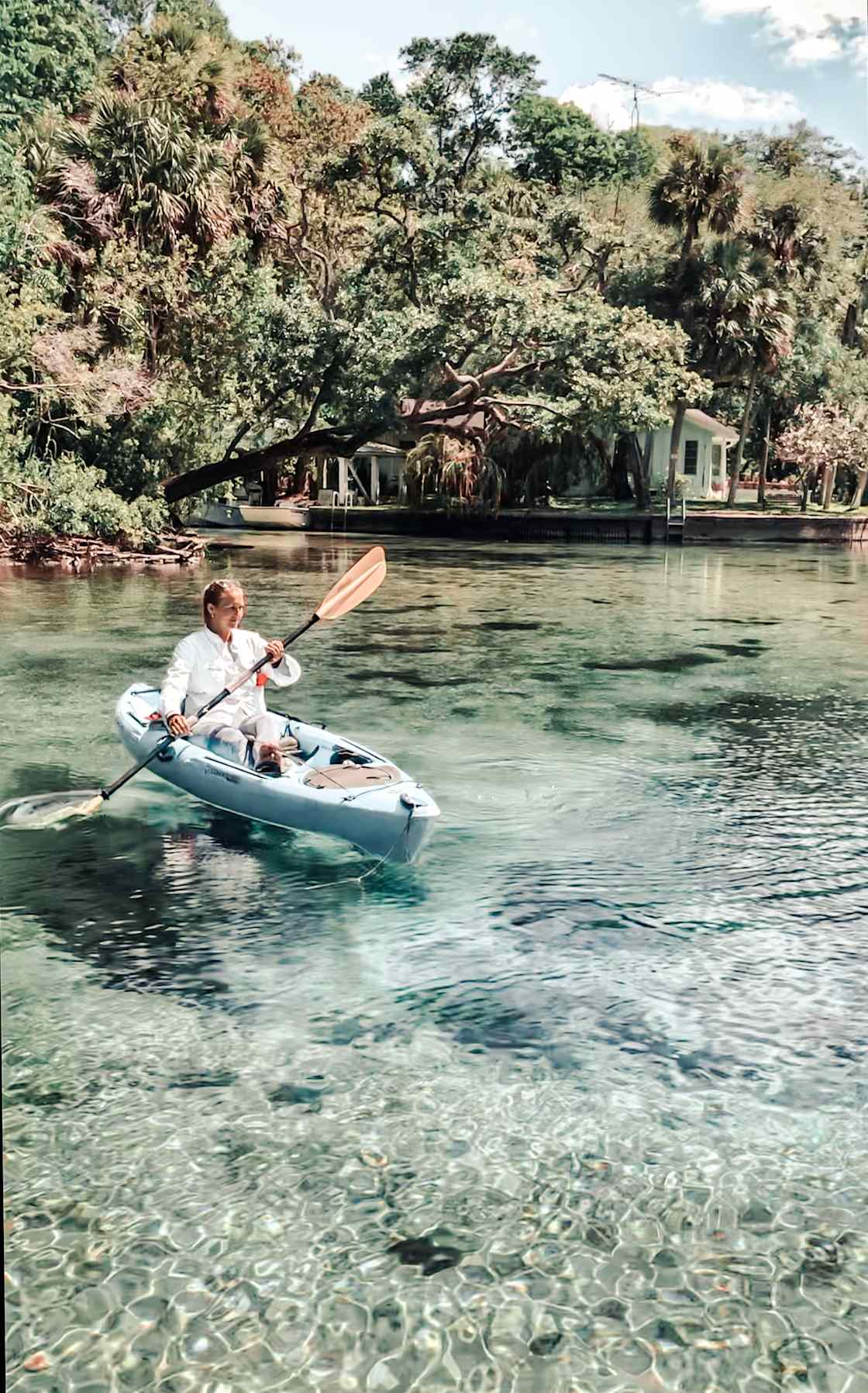 Paddling in front of Kate's home