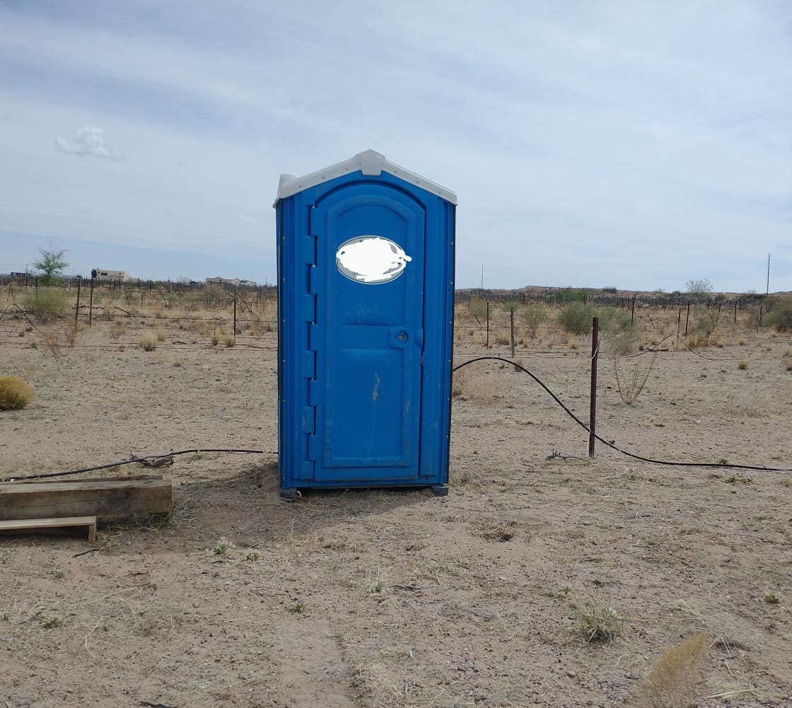 Portable toilet available for guests