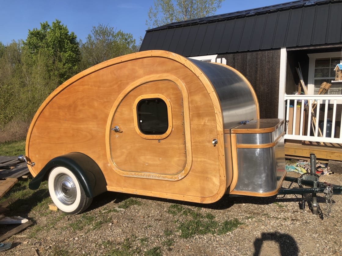 This is a wonderful Handmade Travel Trailer on the property that Lauren’s Dad made. Very well done!