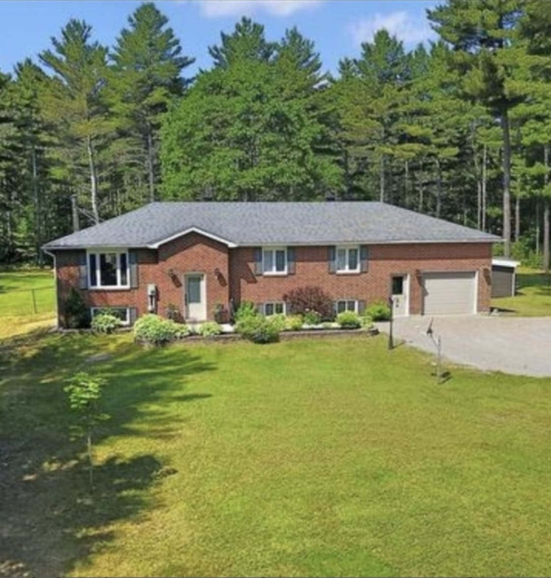 Home Base is on a 1 Acre property backing onto a pine forest and the Heritage Trail.