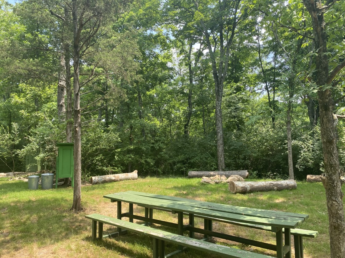 Hideaway Ridge includes a picnic table and supply cabinet, with plenty of room to pitch a tent.