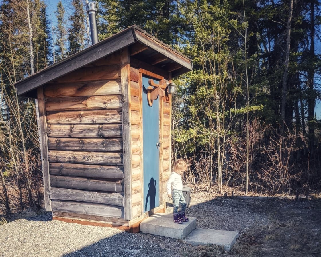 Electric wired and heated outhouse
