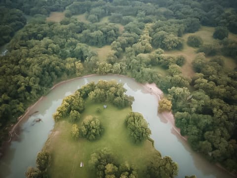 Aerial drone shot of our campsite, which is hidden beneath the shade of the pecan trees at the tip of the "peninsula".