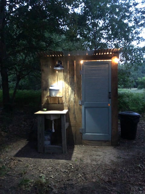 the compost toilet and hand washing station is pretty at night.

