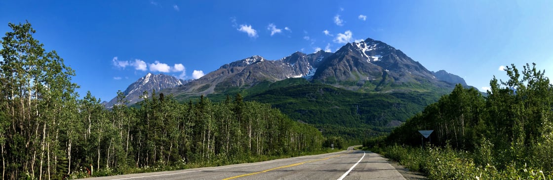 The beautiful Chugach Mountains, as seen from the driveway entrance to the Raven's Den campsite (bottom left corner of picture), on the Richardson Highway.  Milepost ~45.8