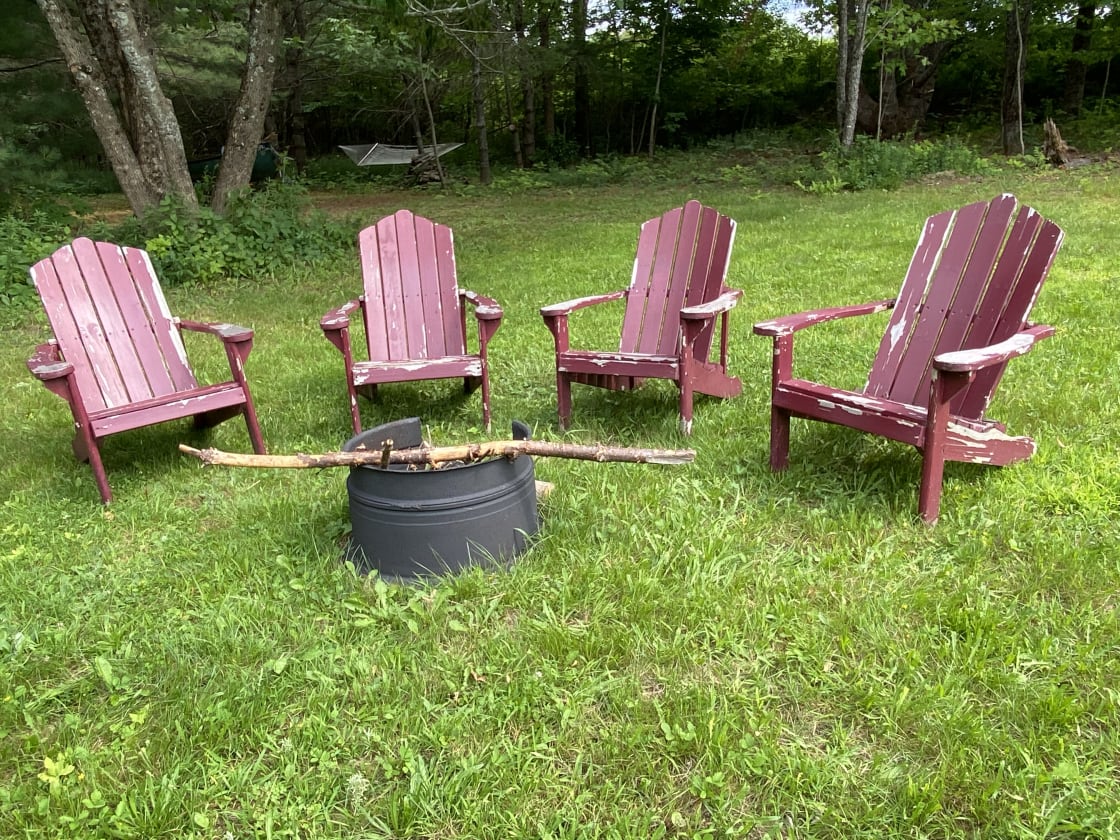 Campfire pit with plenty of wood on site
Hammock and Adirondack chairs too. 