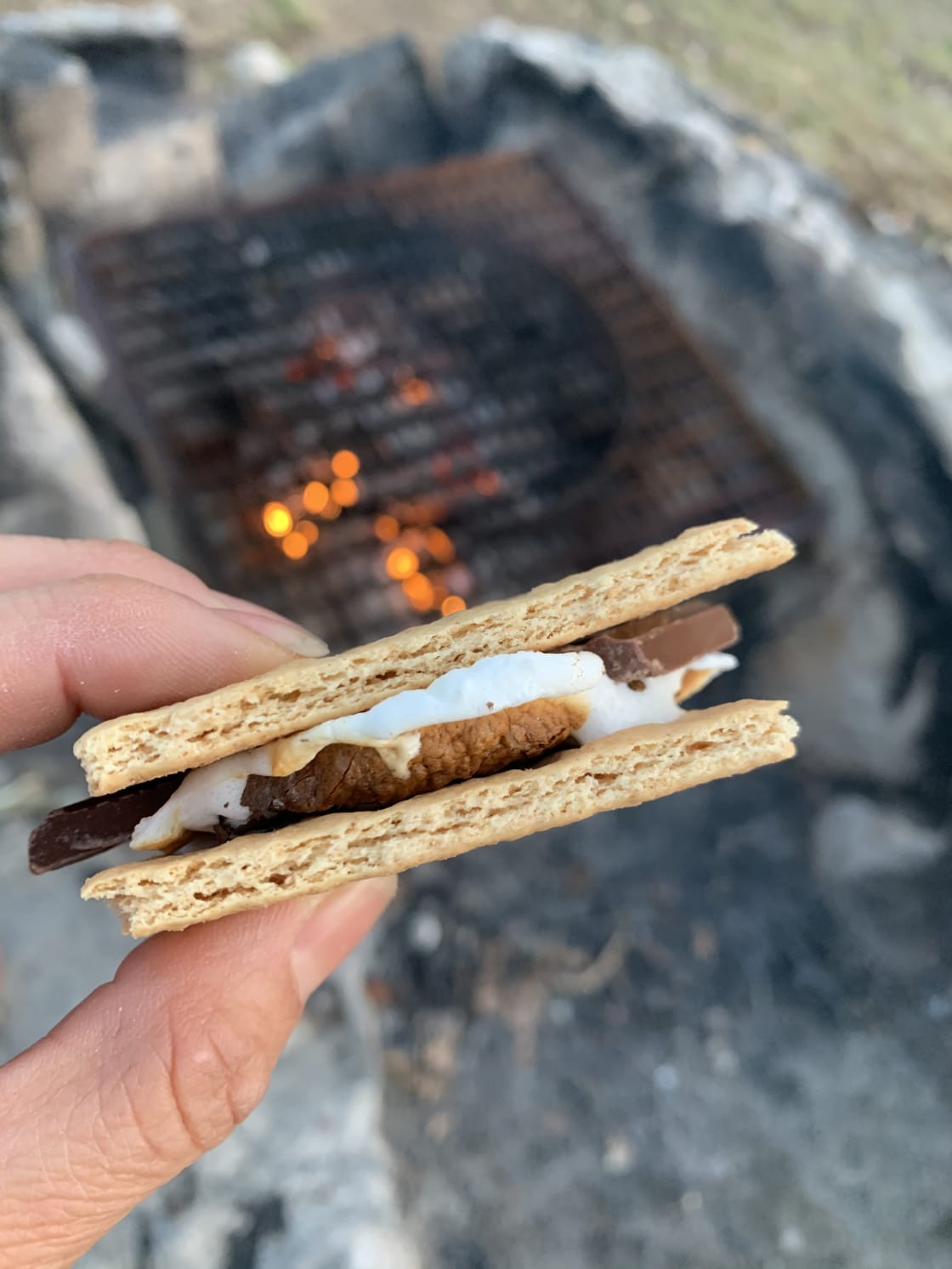 The most perfect s’more I ever toasted on my epic rock fire pit. 
