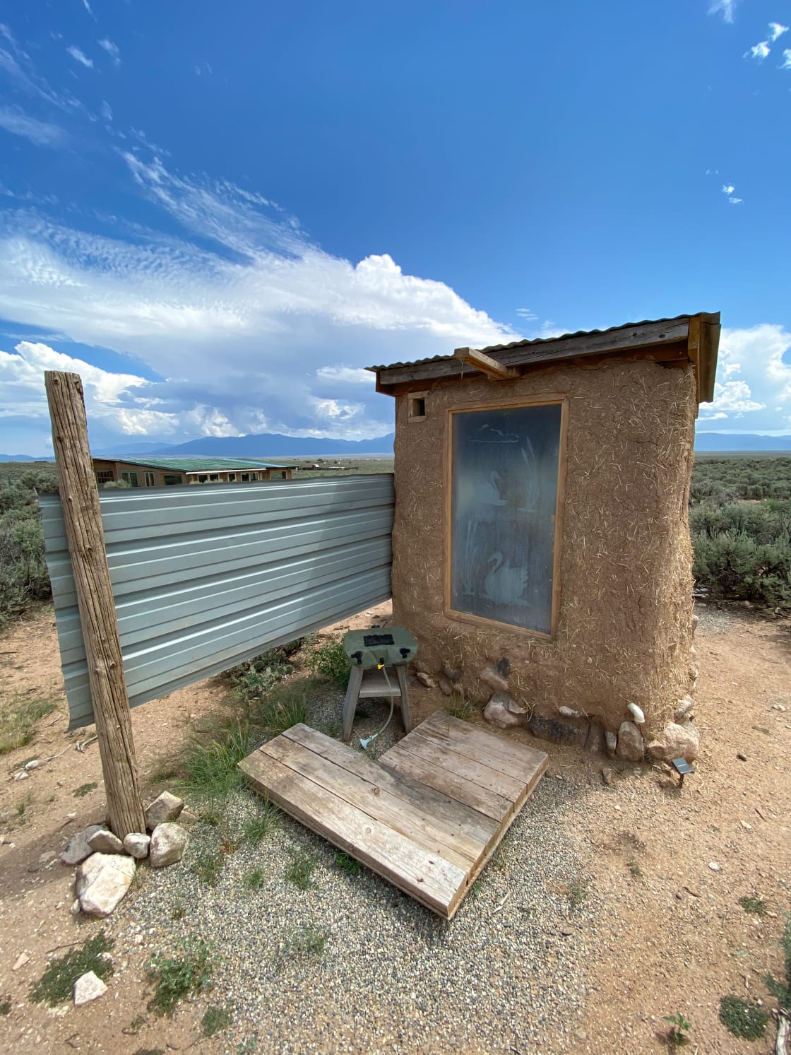 Outhouse and solar showering area