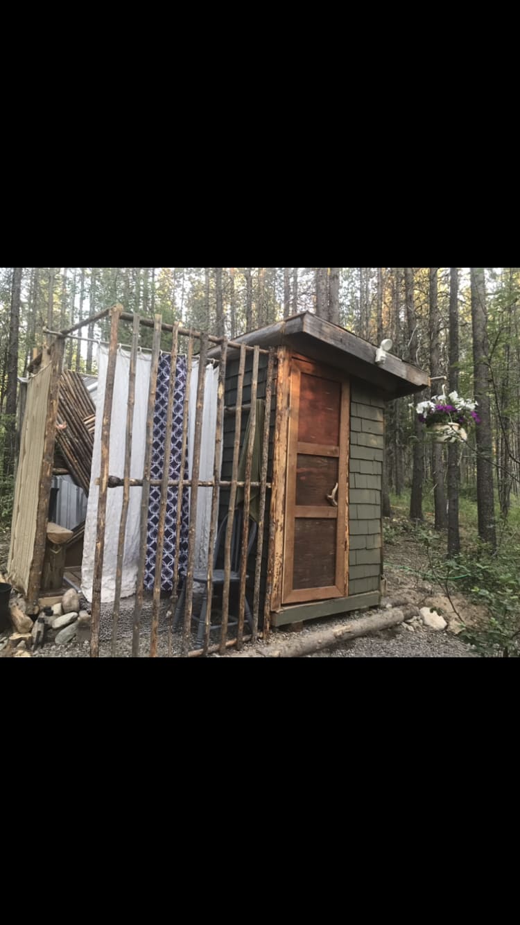 Shower/bathroom building. Private, locking bathroom door and a shower you won’t want to get out of 