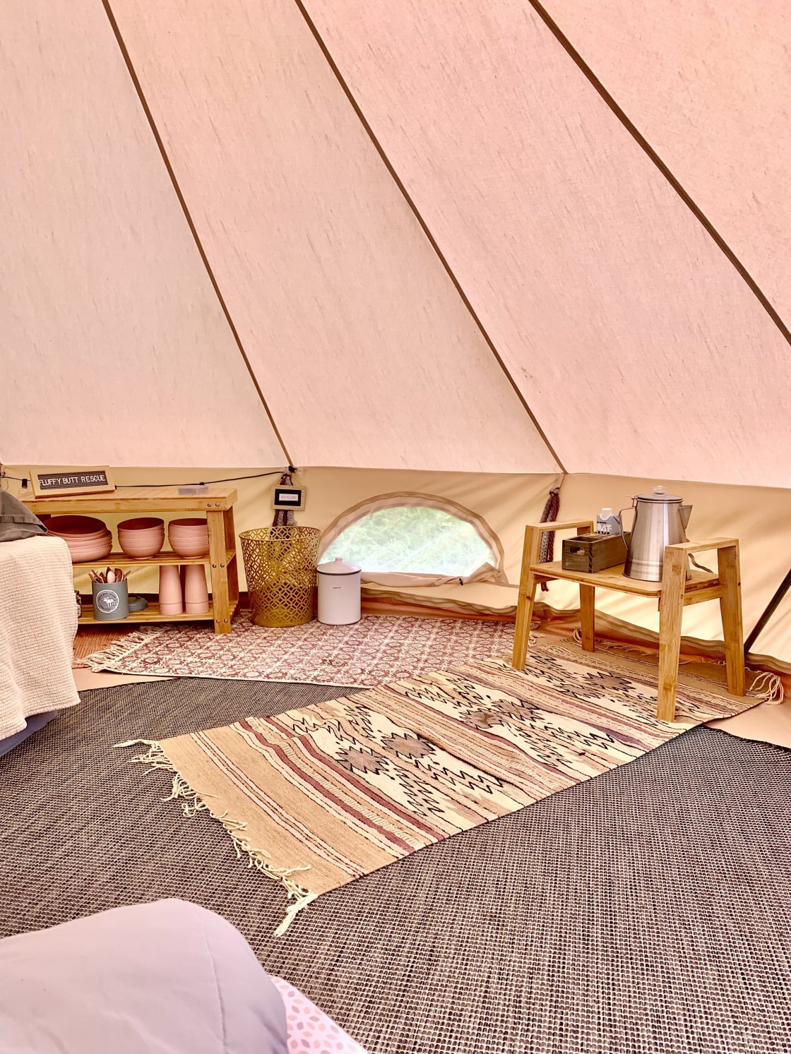 The tent is set up with a double-size bed and is spacious.  A twin size mat or crib mattress is available to accommodate additional guests.
