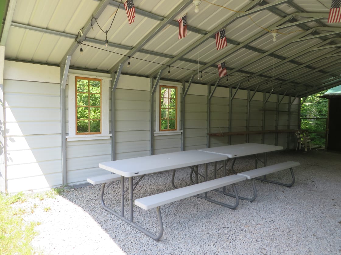Enjoy a family/group meal together in comfort, with easy access to the kitchen. If needed, move and rearrange picnic tables to suit your needs. Kindly return tables to original location upon departure. 