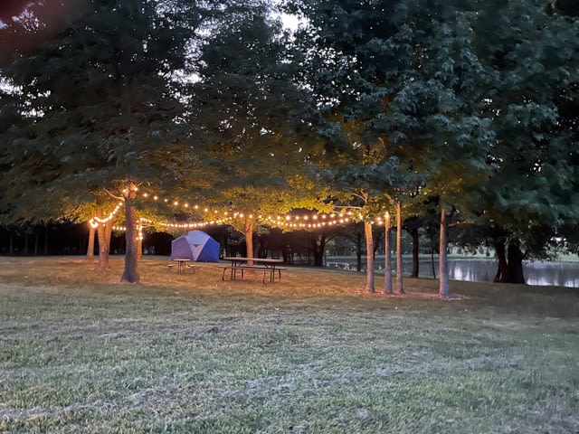 Bistro lights bring the tent site to light in the evenings