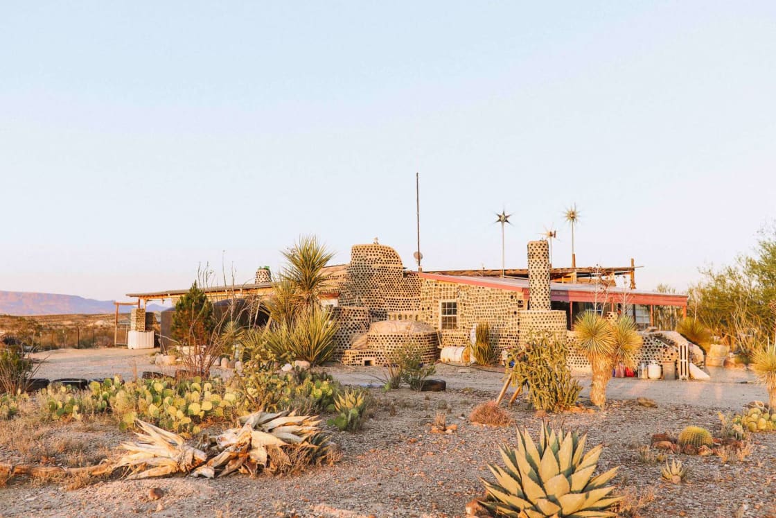 Your sustainable campground sprawls around our 20 acre property. The bottle house, above, anchors the ranch. 