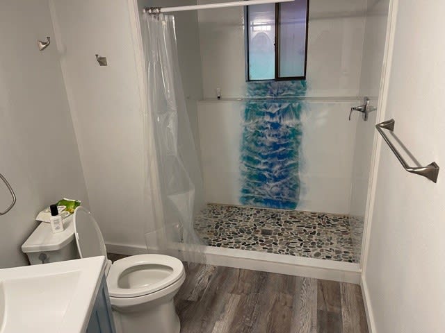 Showers + bathroom available 24/7, located right off of community room