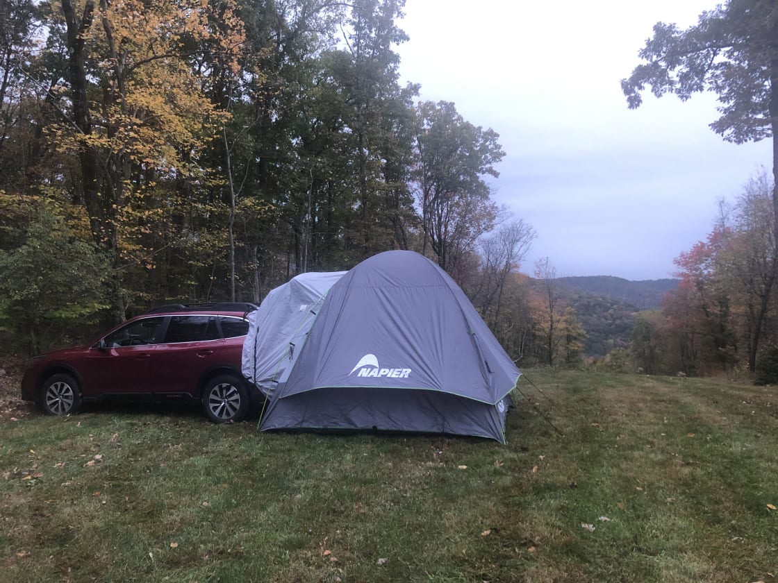 Car camping with privacy and a great view. The picnic table and fire circle hidden by our car
