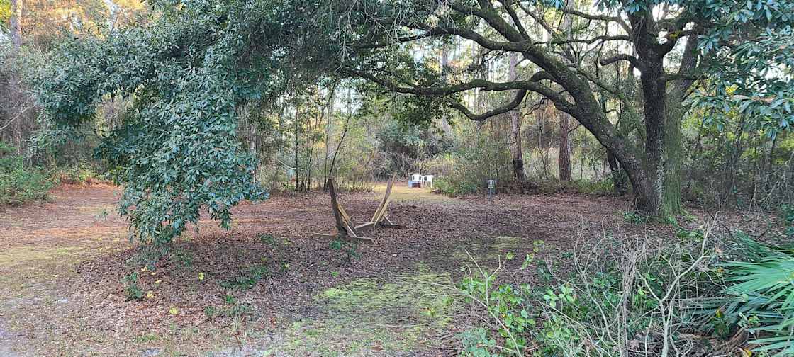 As seen the chairs and fire ring are for the small site near the pond.