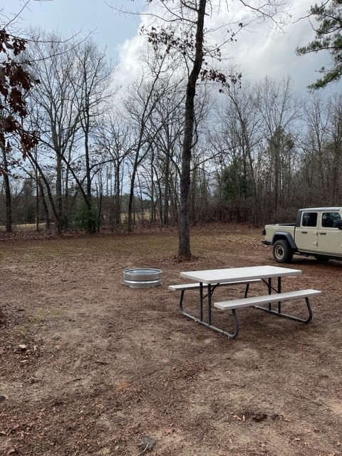 Campsite with table and fire pit