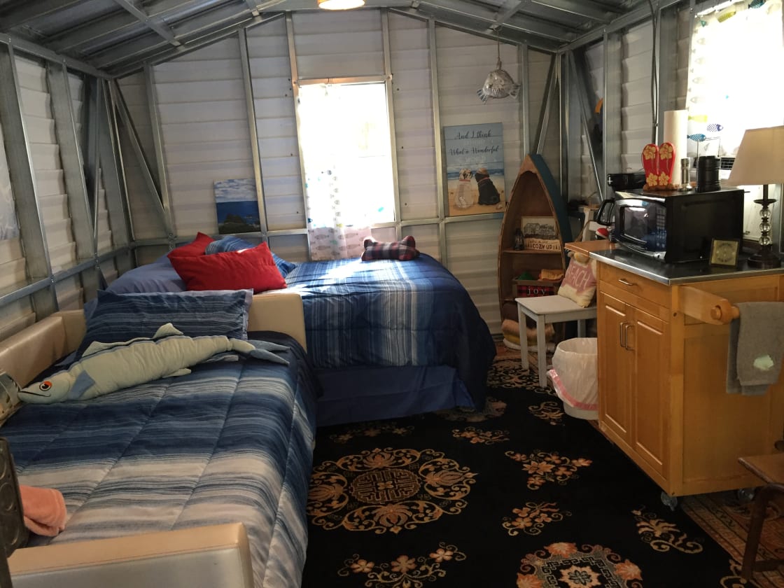 Your cabin inside furnished with a full sized with pull-out trundle bed for additional two twins.  Four-person max.