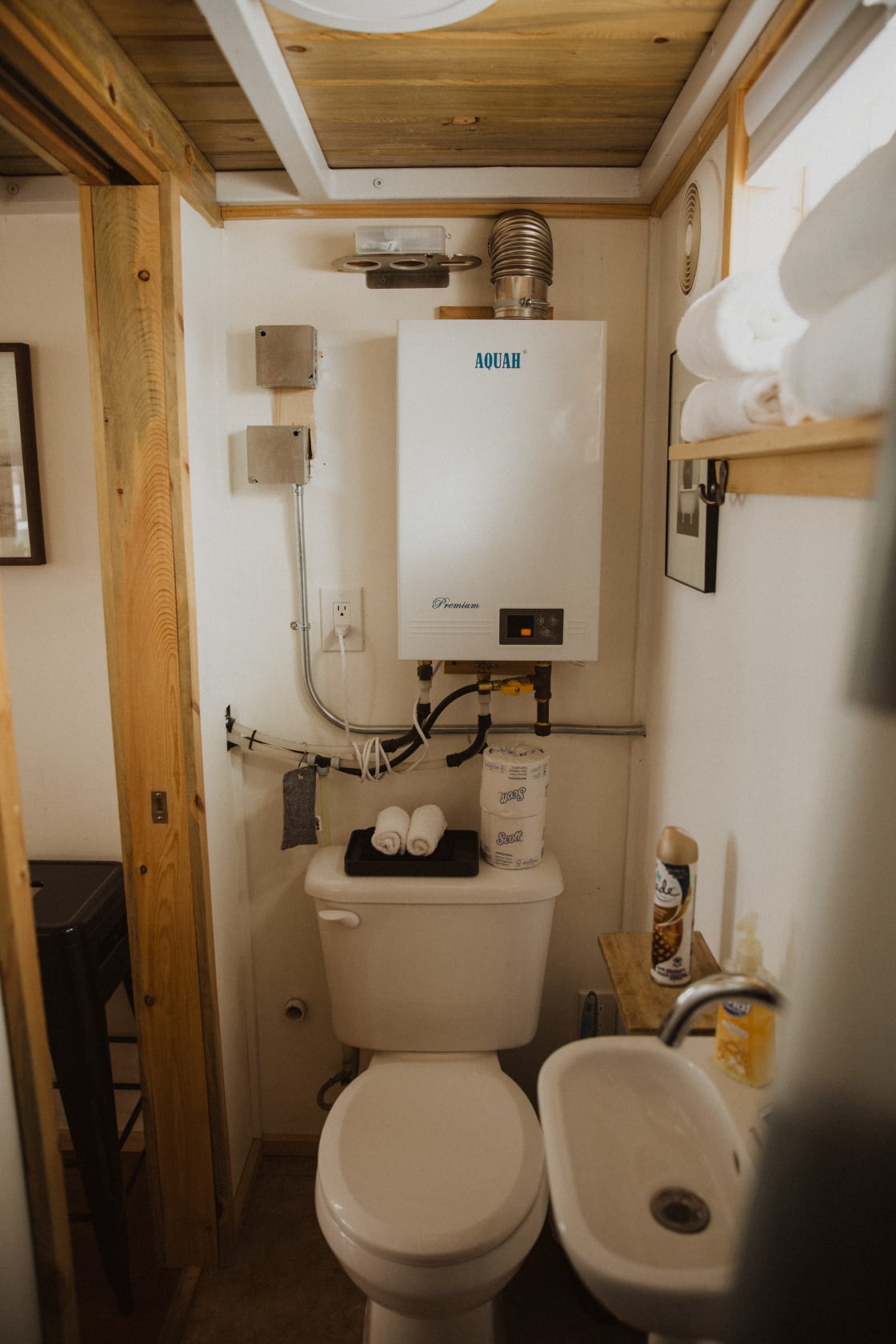 The full bathroom at the back of the tiny house. 