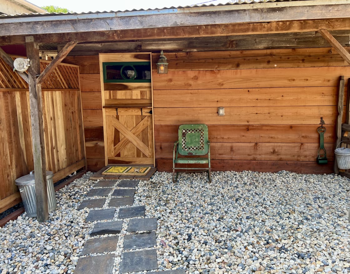 Cabin entrance with a private, pet-safe yard.