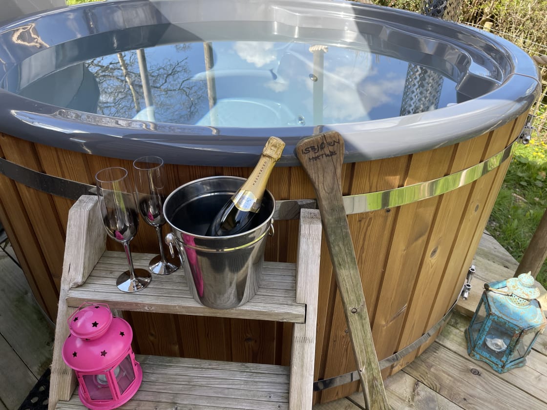Celebrate in style with a bottle of bubbly in the hot tub!