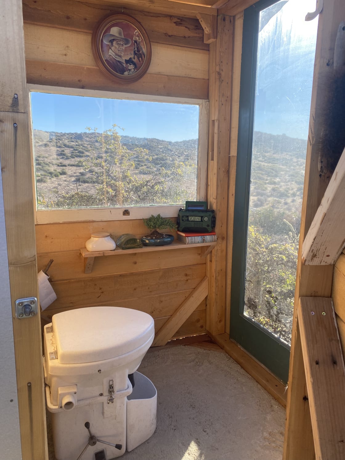 Composting outhouse with a view