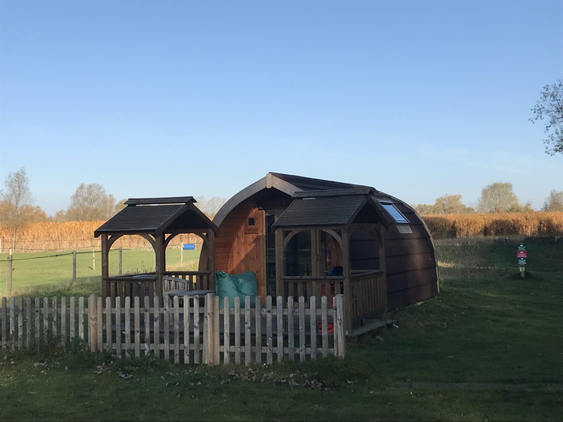 Our cosy unique Woodpecker Pod is situated on the edge of The Members Campsite at Chigborough Farm. It has a fantastic view of Home Water Trout Lakes. It is next to Horses Paddocks and a Maize Maze. 