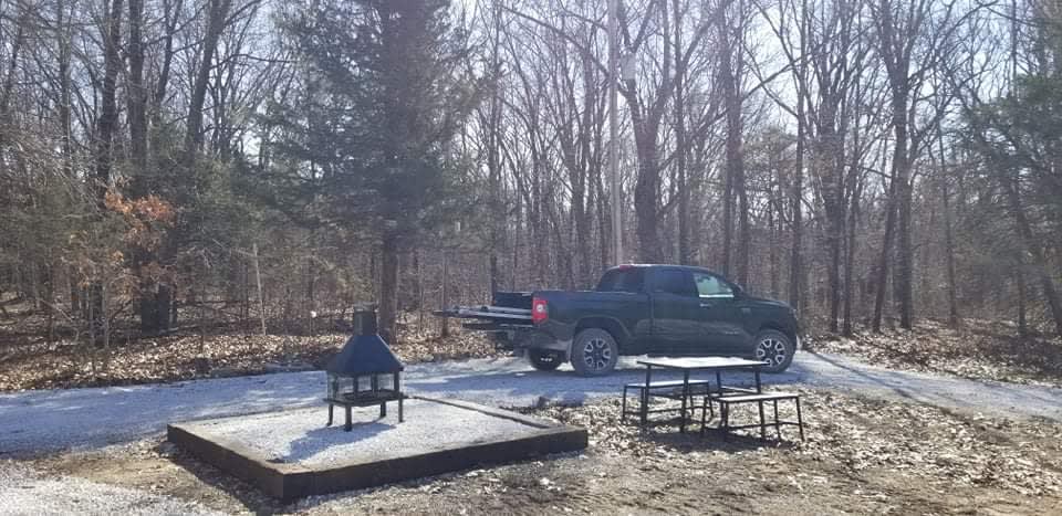 We provide a picnic table and fire pit at our campsite. 