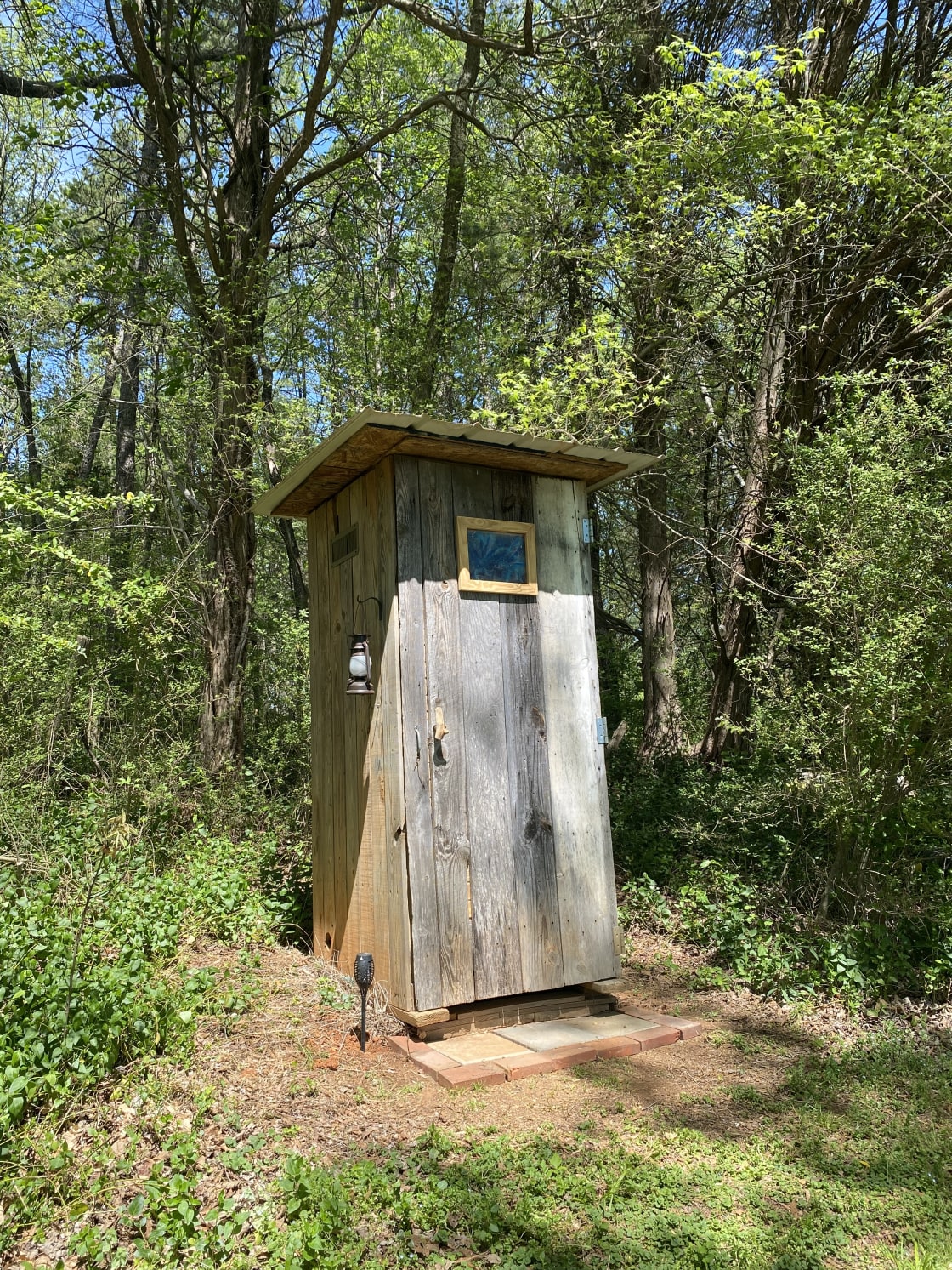 Nearby clean outhouse