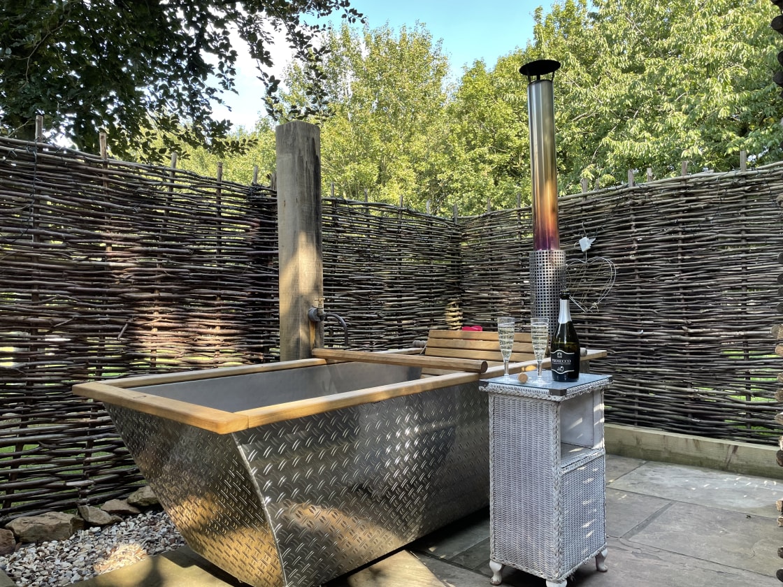 The perfect place to relax, the outdoor wood-fired hot tub