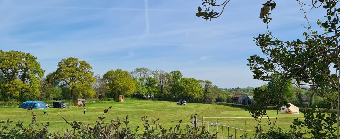 Buckland Farm Camping - campsite view. Spacious pitches, over 5acres and just 15 pitches total.