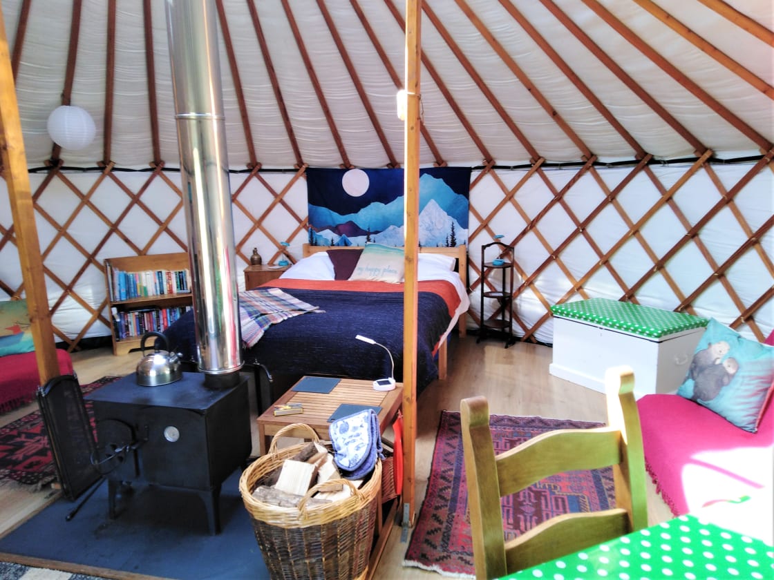 Luxury yurts with all bed linen provided, toys, books, cooking equipment and a great little log burning aga to cook on indoors. 