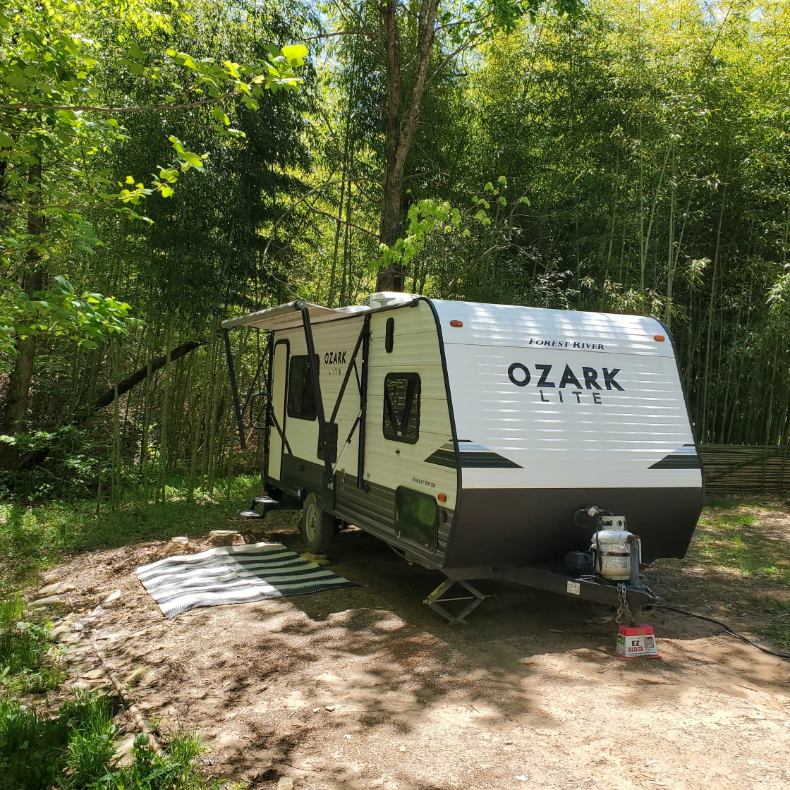 Camp in front of the creek.
Park your vehicle next to trailer.