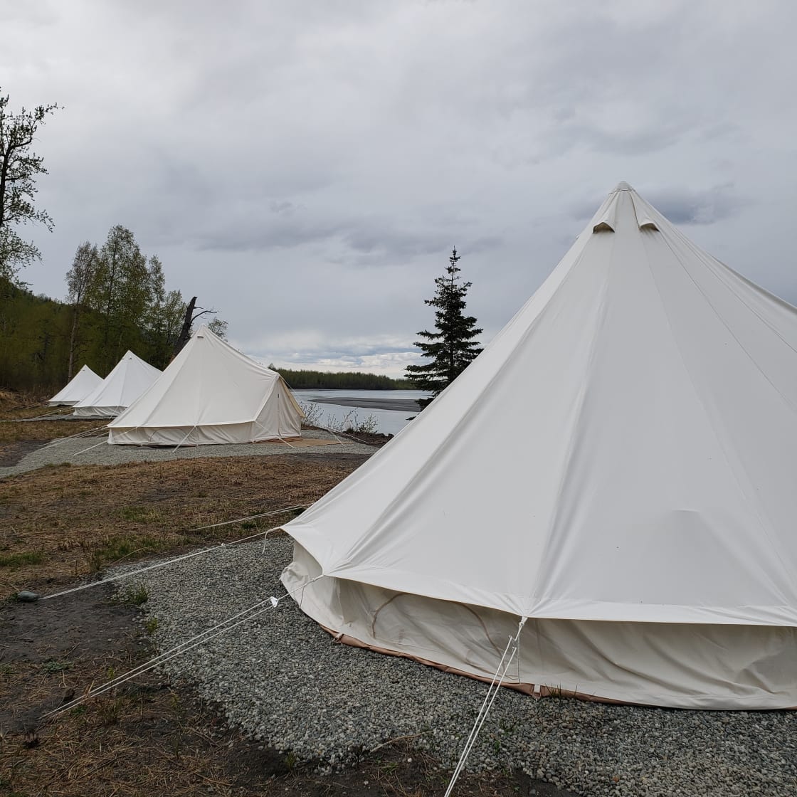 Four of our tents are set up along the Knik River