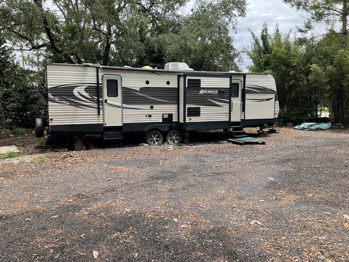 Plenty of space for your RV, this one is 35 feet.  We also have a portable deck, cooking area, patio furniture and just about anything you forgot!