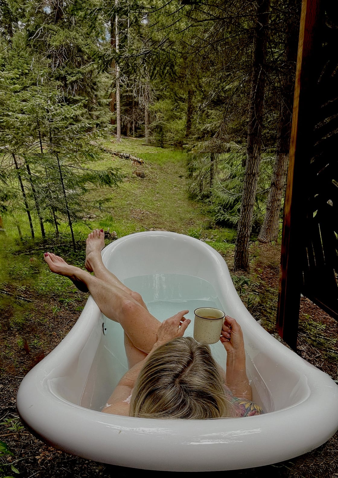 Seasonal outdoor tub - June through October. Relax outdoors in a private outdoor clawfoot tub with plenty of hot water.
Photo by Mary La 2022