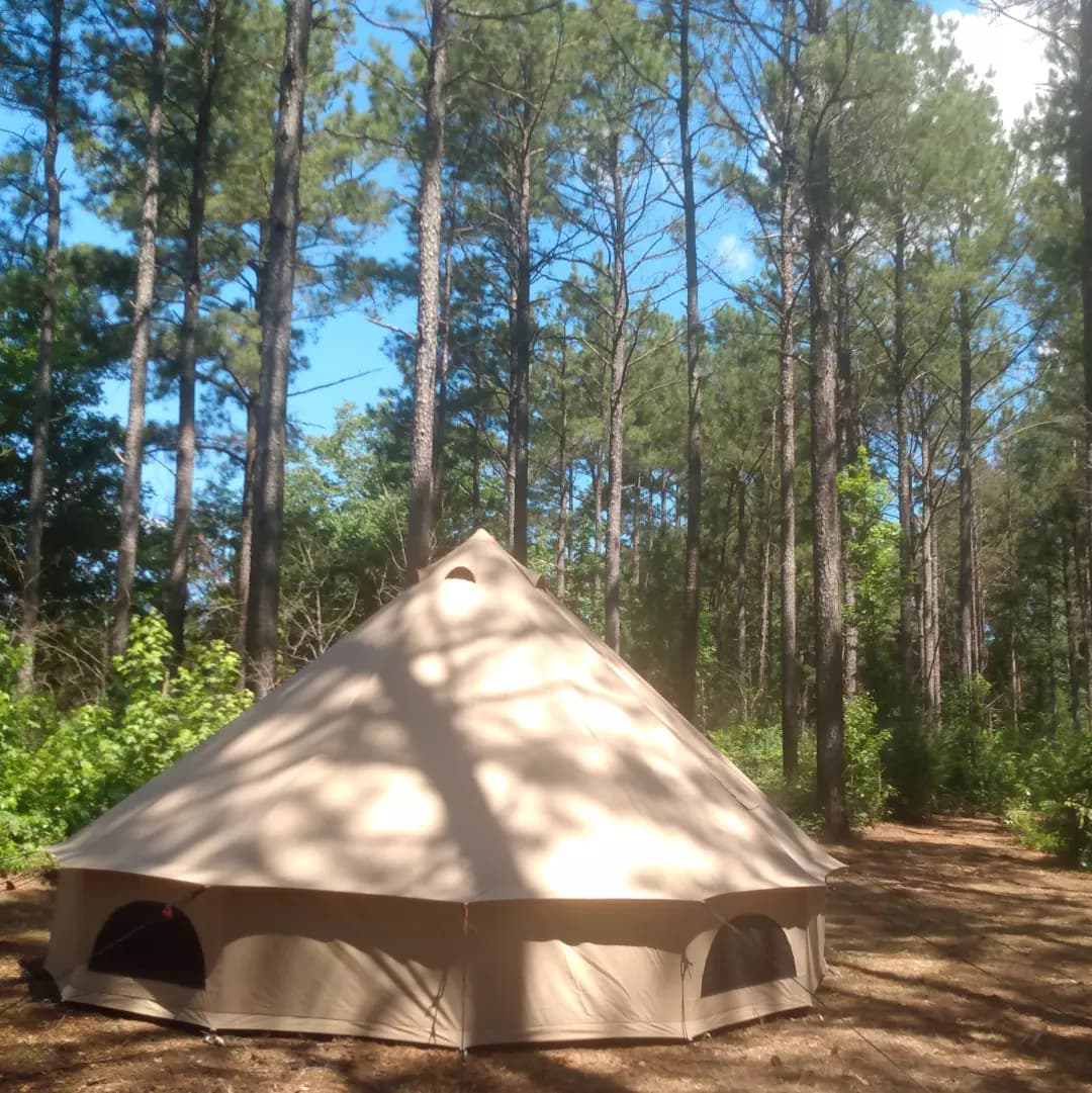 The bell tent has a large footprint.  16.5 feet across and 9'8" tall at the center.