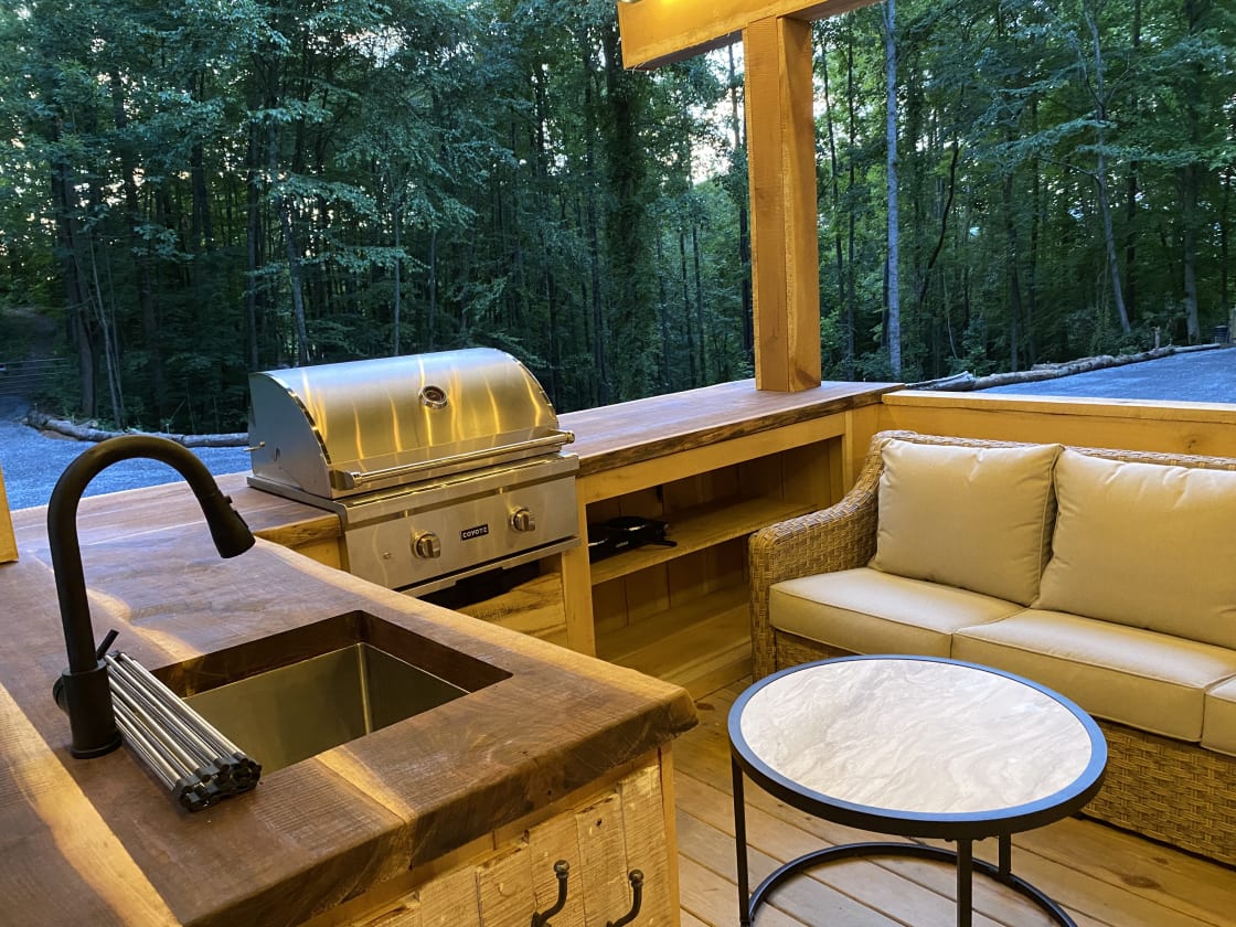 Grill, Sink, and outdoor furniture. You can add this to your stay in the extras section