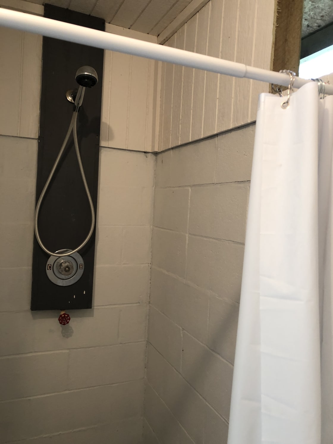 Shower includes hot water