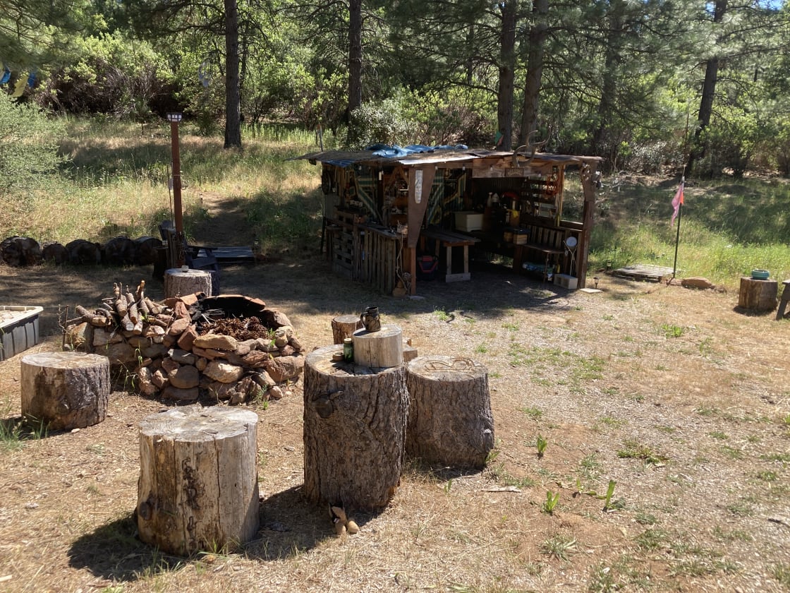This is the Soup Kitchen camping area.  It’s a rustic little shelter that has some solar lights, a solar panel attached to a battery that has plugins to charge phones, speaker, etc. There’s a nice fire pit for when it’s safe. 