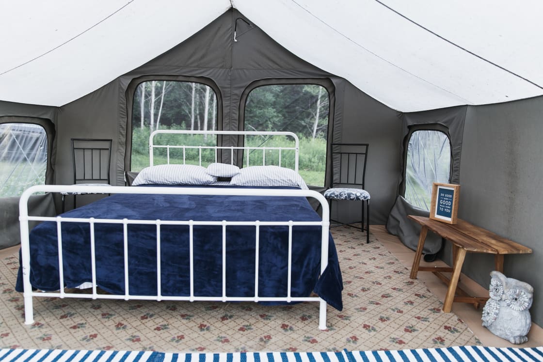 The tent is spacious and well decorated, with an extremely comfortable queen size bed! 