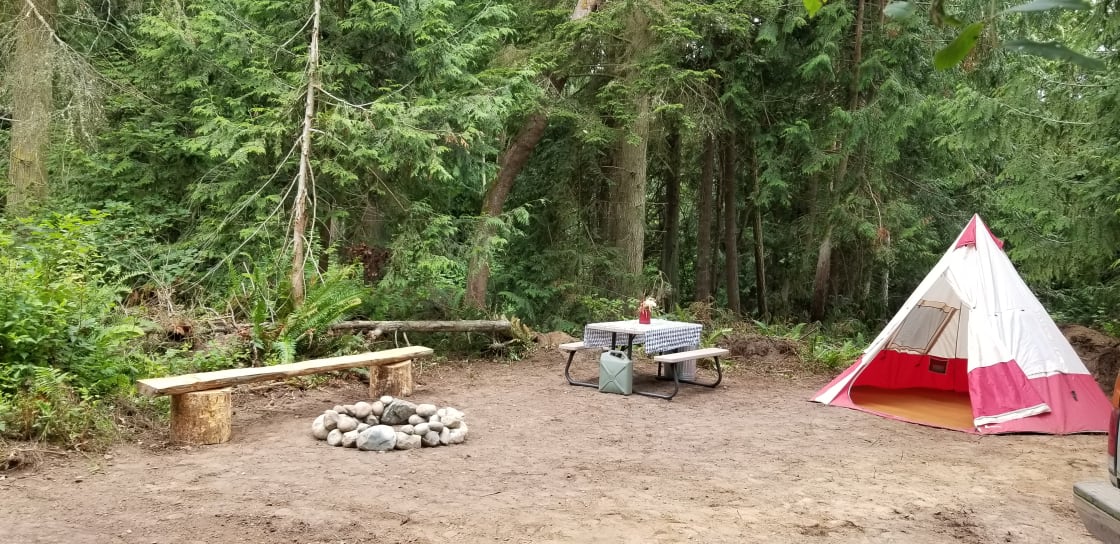 Doe's Rest Campsite. Large and spacious. Nestled back into forest.