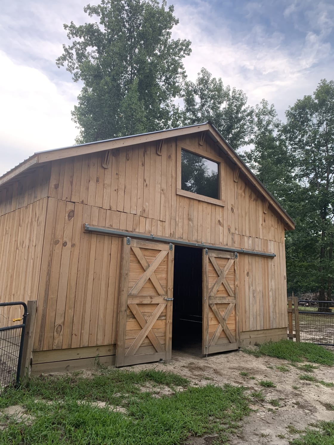 Our barn houses our sheep, goats and Great Pyrenees. All campsites are accessible by parking at the barn and taking a short walk into the woods.