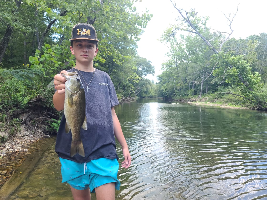 My son caught a nice smallmouth, he was so excited (even though he doesn't smile in pictures).