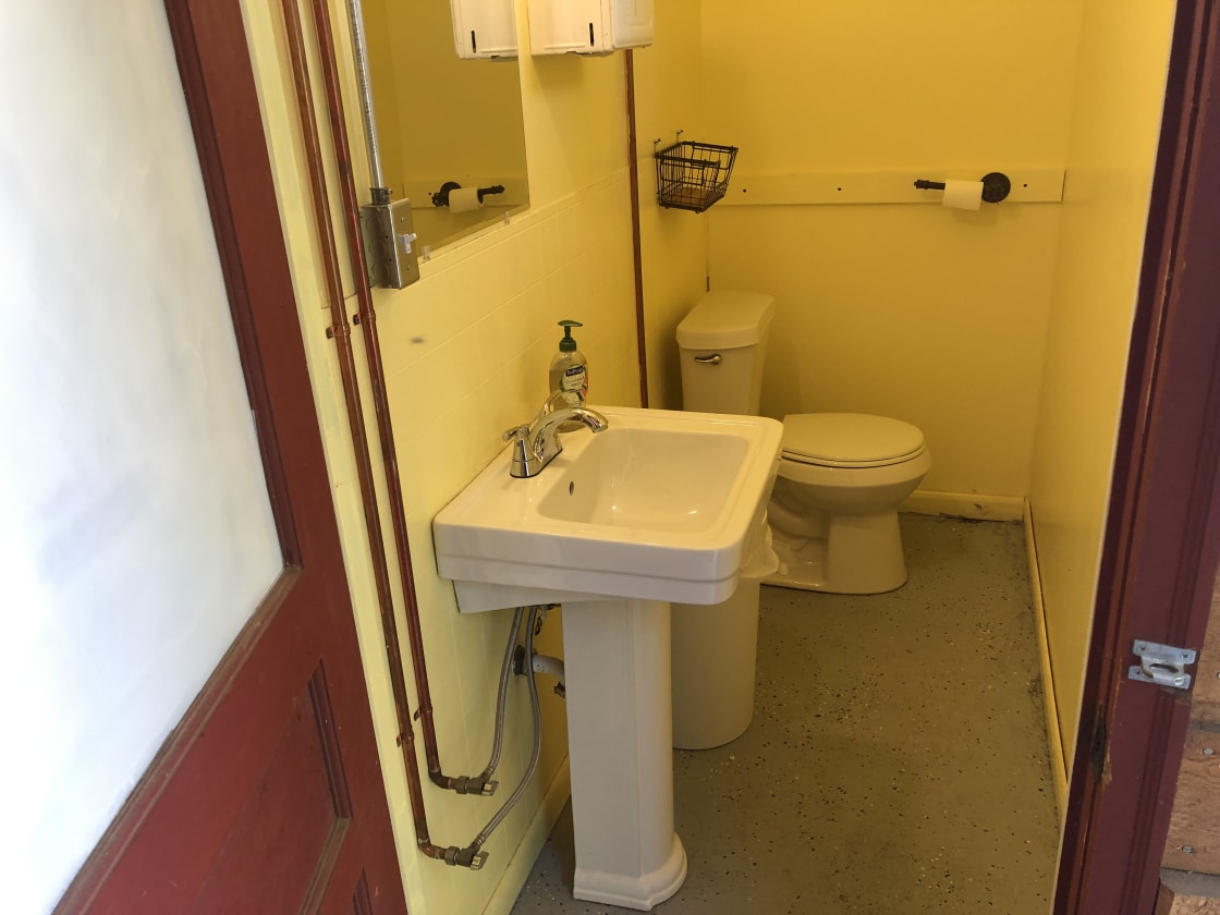 Sink and toilet area at restrooms